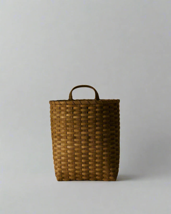Woven pack basket with top handle, dark tan weave