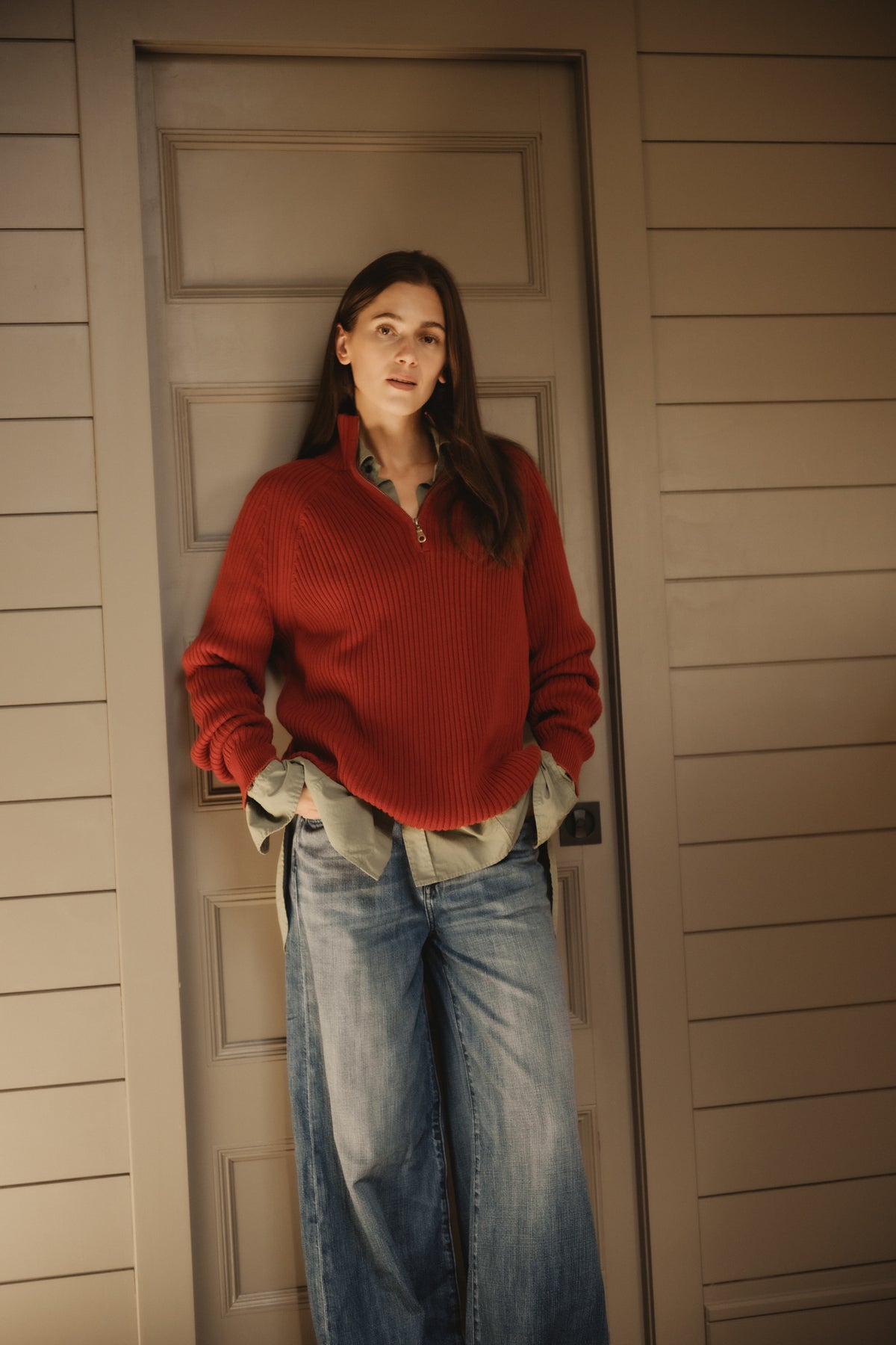 Rust red cotton 1/4-zip sweater with textured knit and ribbed cuffs and hem