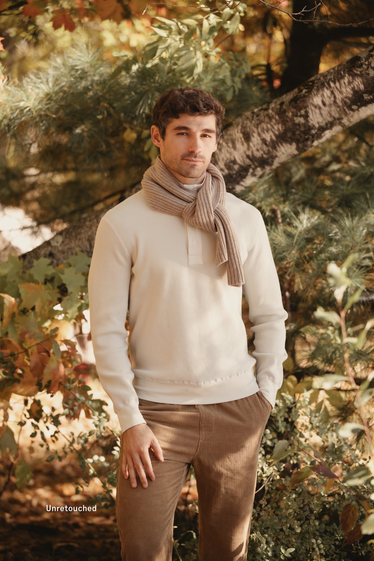 Cream waffle mock-neck sweater with button placket and long sleeves