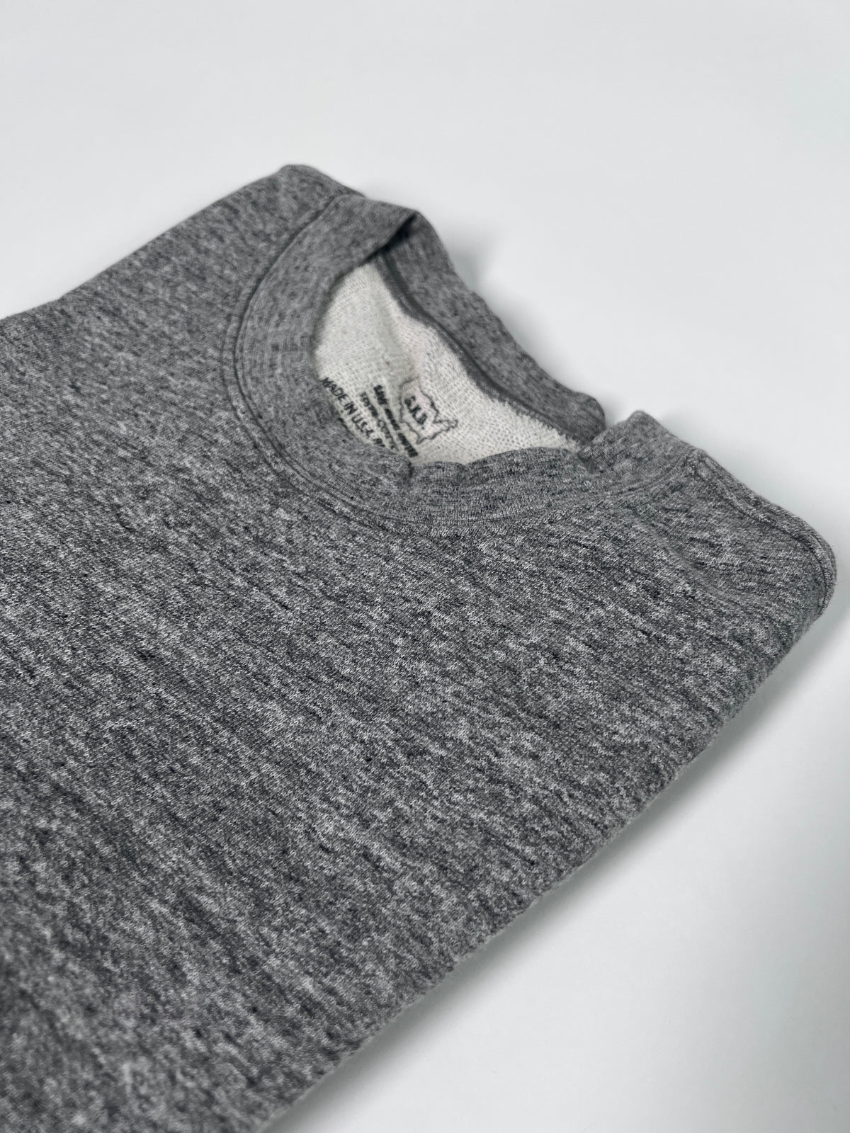 Heather grey French terry sweatshirt crew neck with inner collar tag