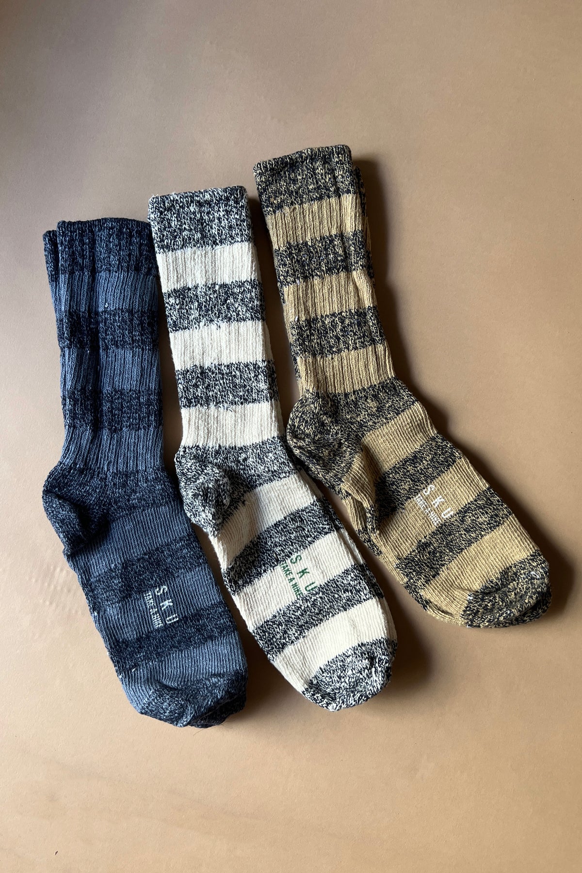 Stripe ragg socks bundle with navy, cream-and-white, and tan stripe socks