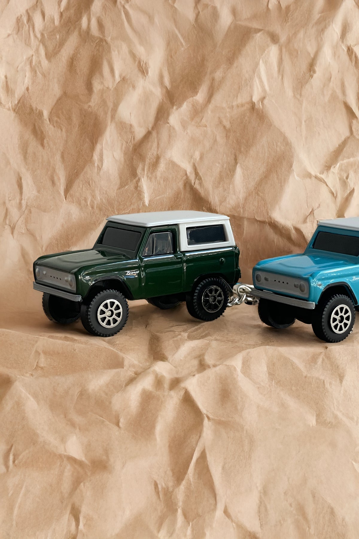 Green and blue 1966 Bronco diecast keychains with metal keyring