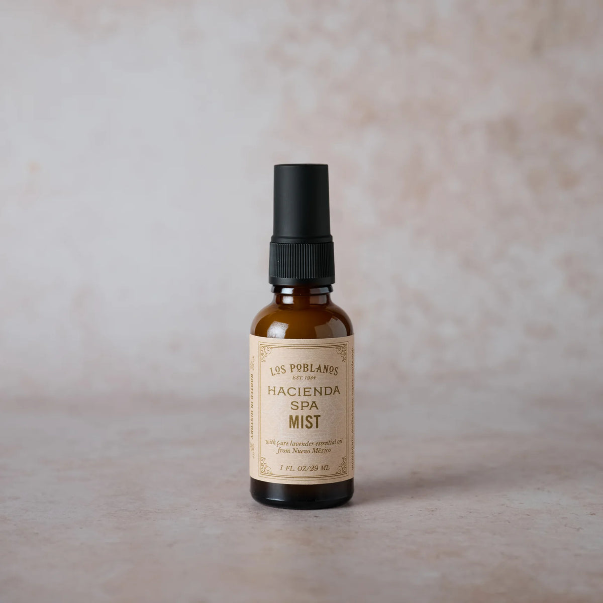 Hacienda Spa mist spray bottle with black pump and amber glass