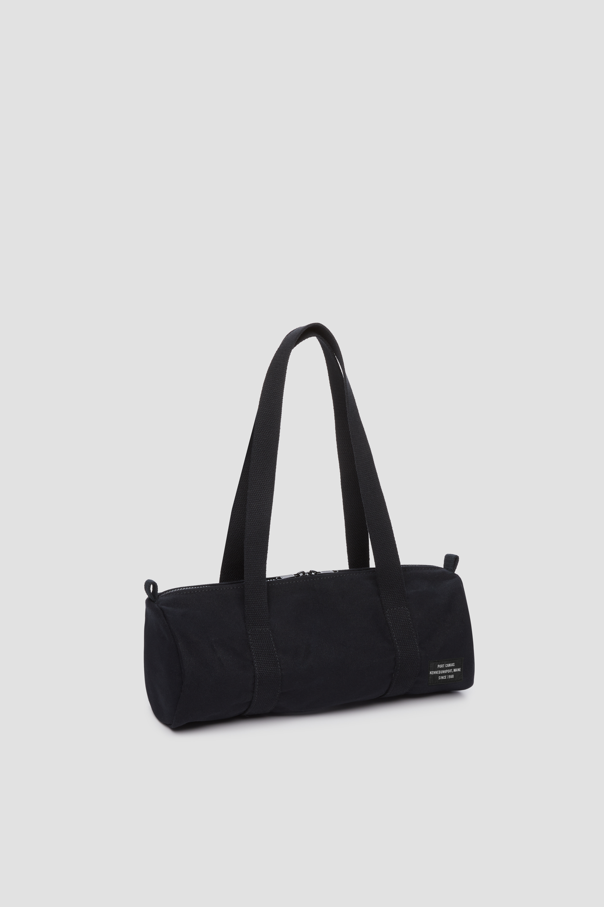 Duffy canvas tote duffle bag, black with long handles and front label