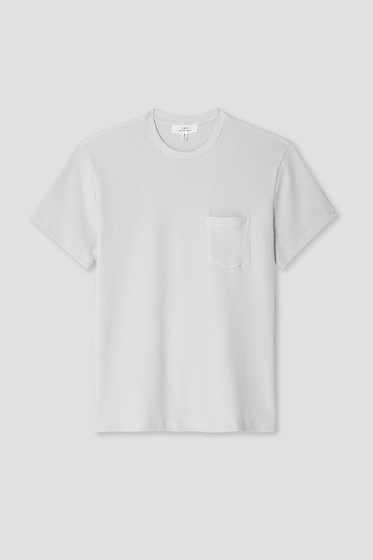 White waffle pocket tee with short sleeves and crew neck