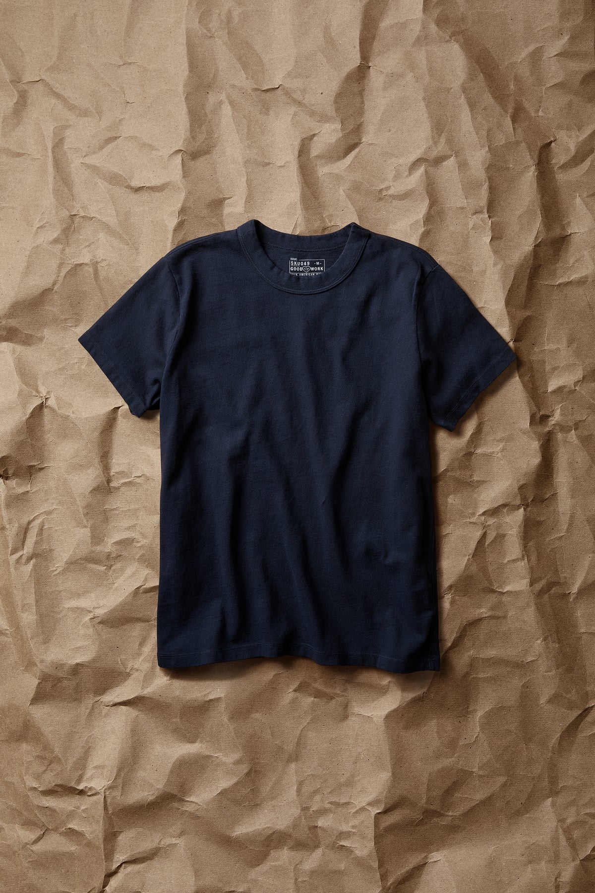 Navy short-sleeve crew-neck T-shirt with ribbed crew collar and straight hem.