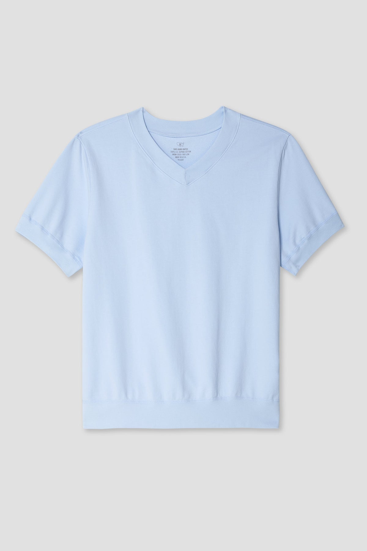 Light blue V-neck sweatshirt laid flat, short sleeves, ribbed hem