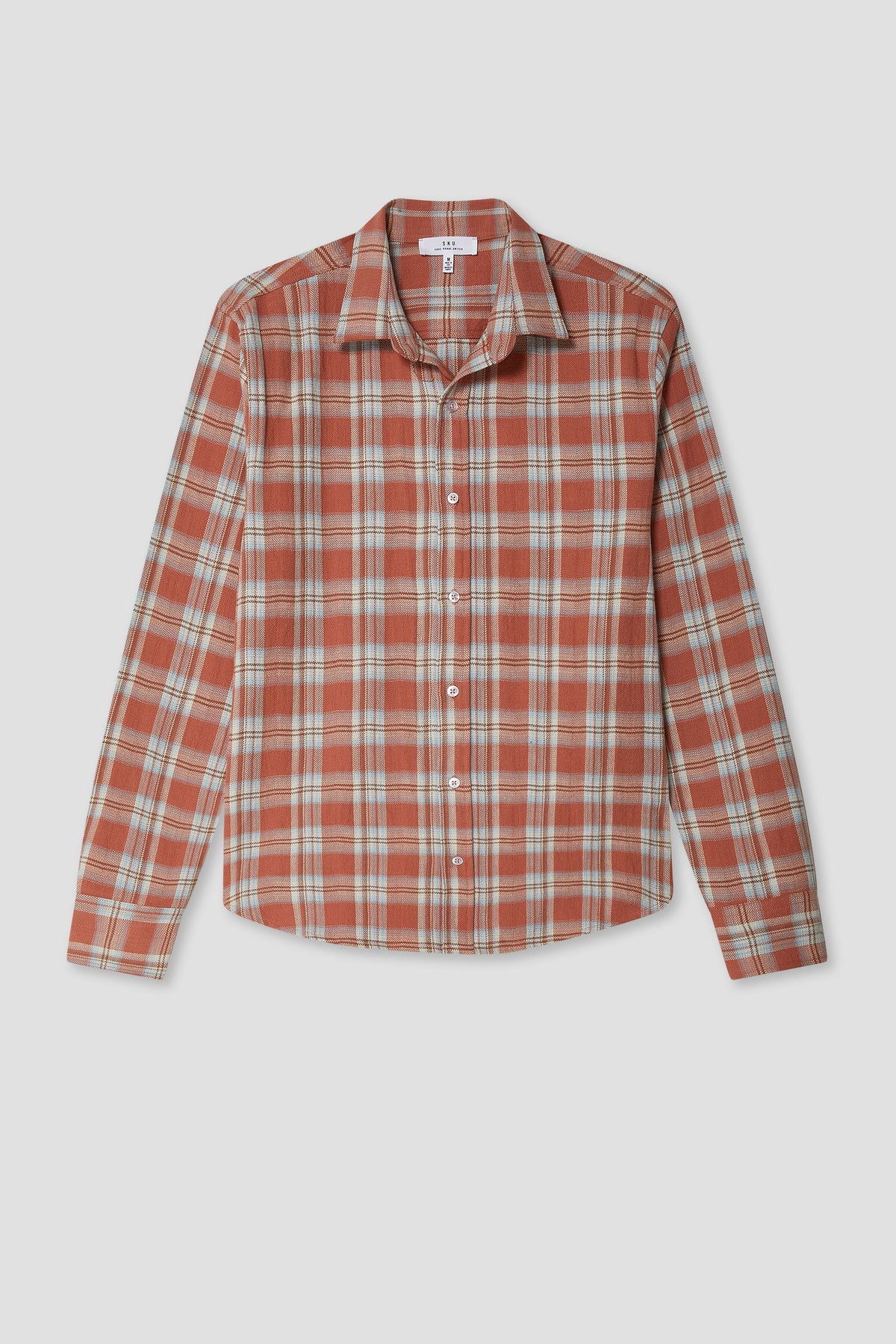 Burnt orange plaid flannel slub shirt with button front and long sleeves