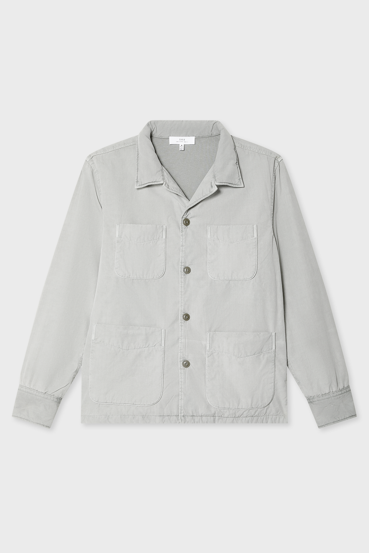 Light gray camp shirt jacket with button front, pointed collar, and chest flap pockets