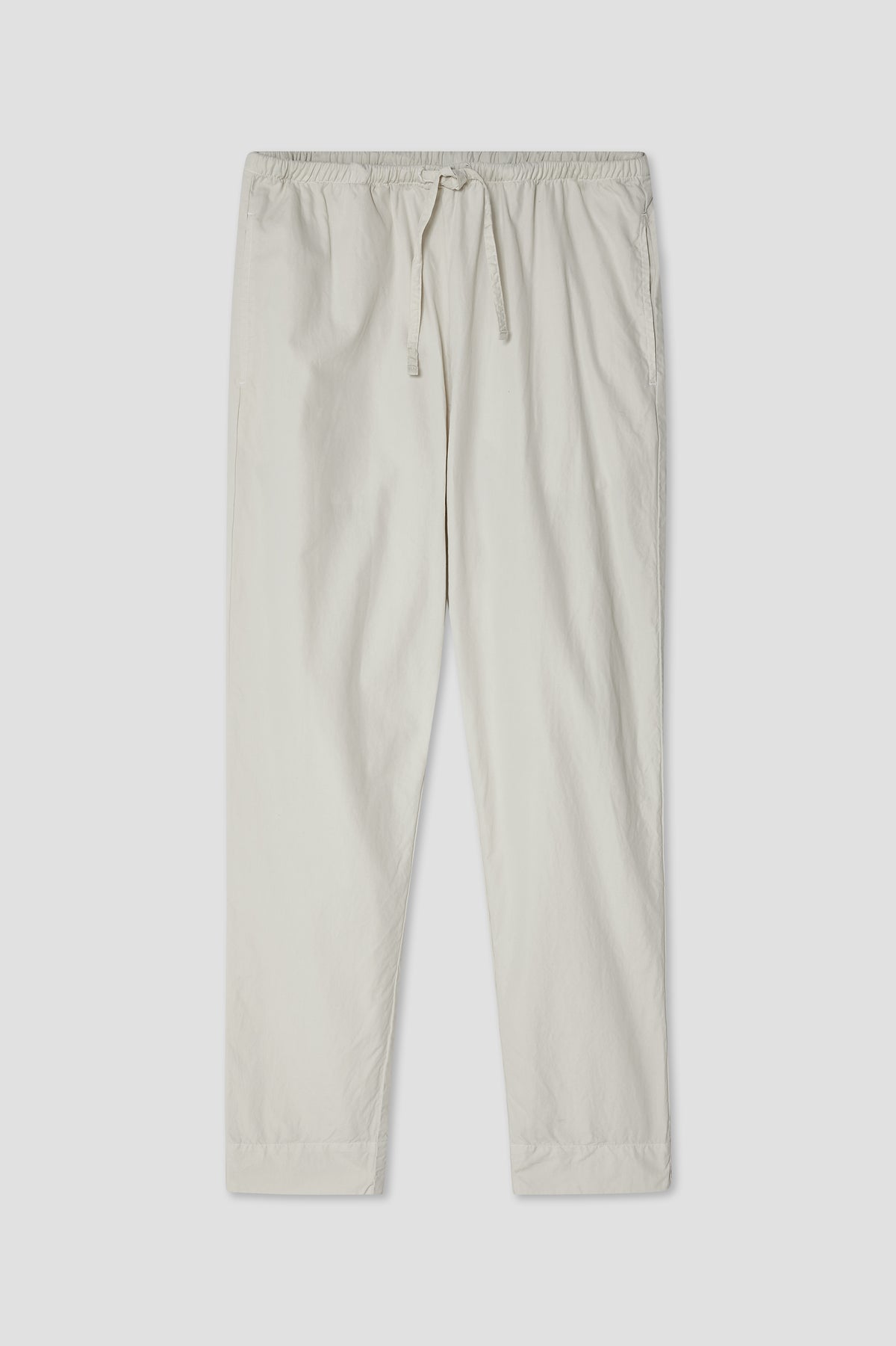 Light cream poplin drawstring pants with elastic waist and tapered straight legs