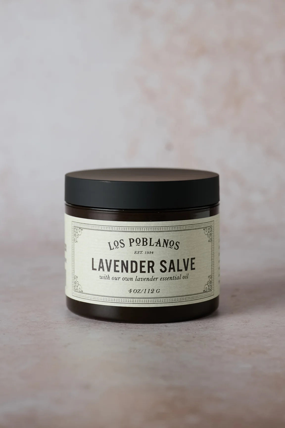 Los Poblanos Lavender Salve jar with black lid and beige label
