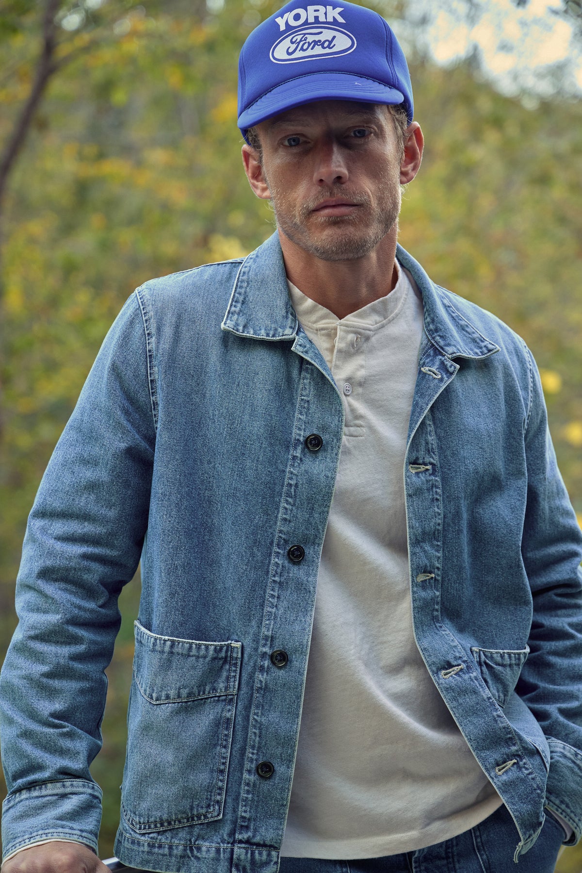 Blue baseball cap with YORK Ford logo, slightly angled front view and brim