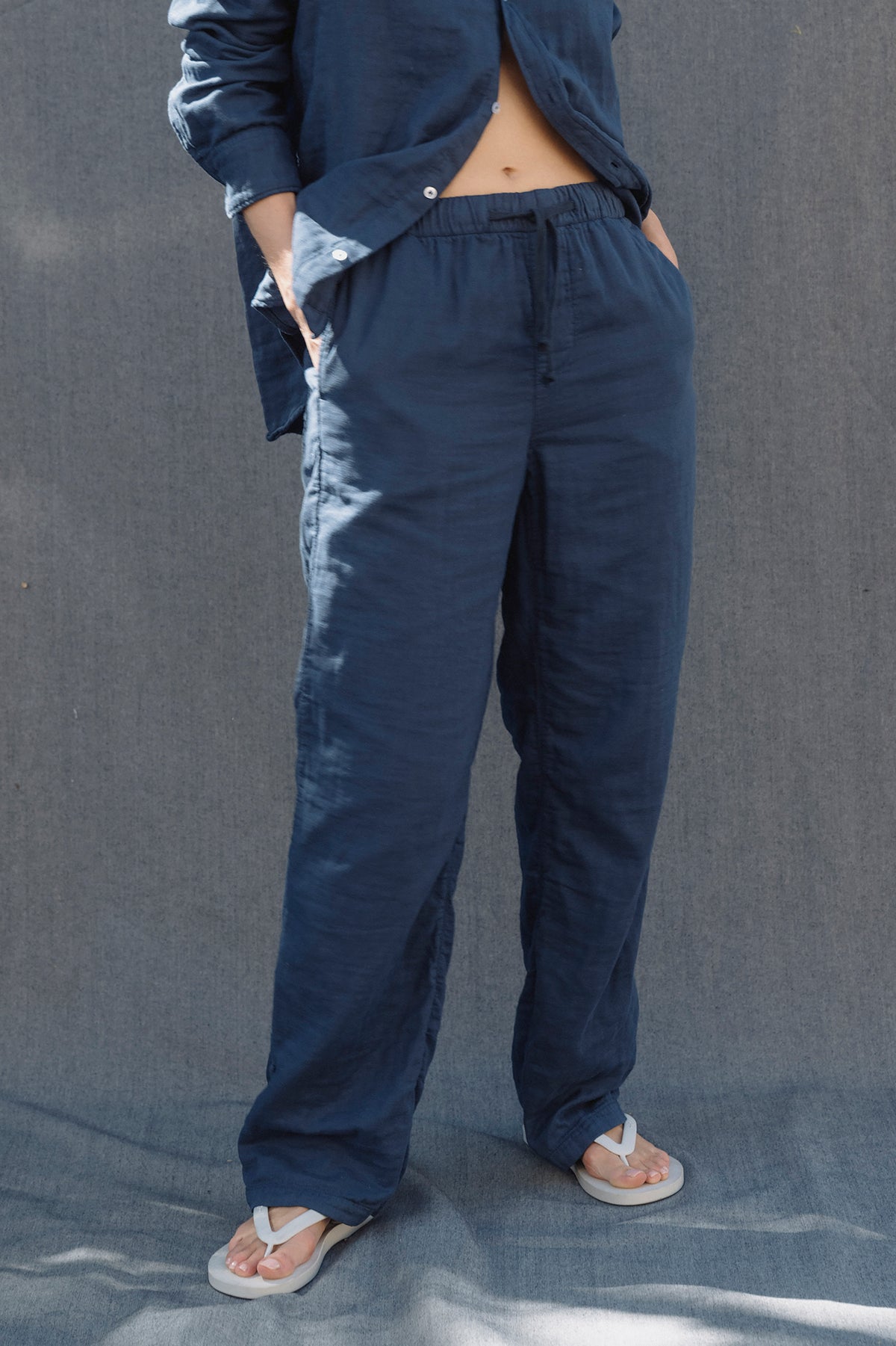 Triple-gauze pants in navy with elastic waist and drawstring; relaxed wide-leg