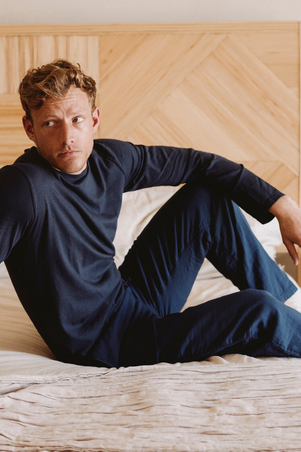 Deep navy long-sleeve crewneck lounge tee, organic cotton-hemp blend.