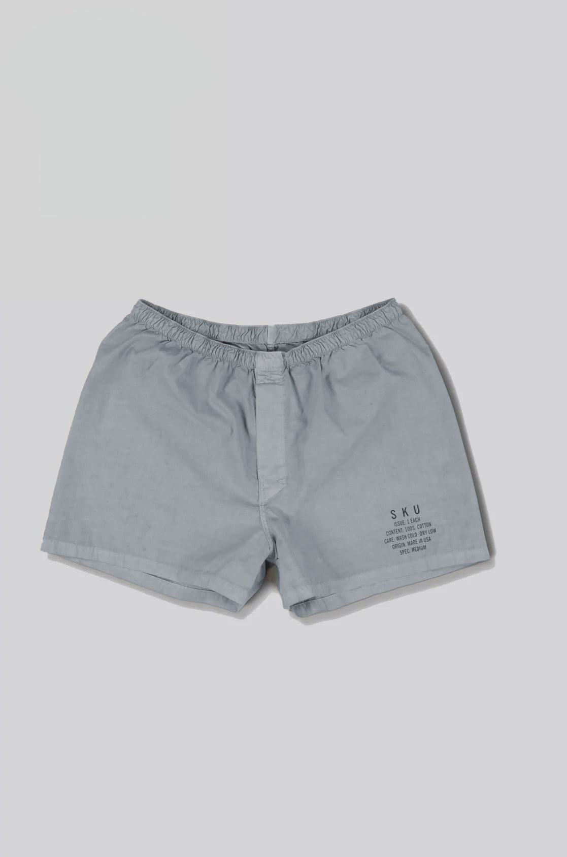 Washed dye field boxers in light gray-blue with elastic waistband and side pockets