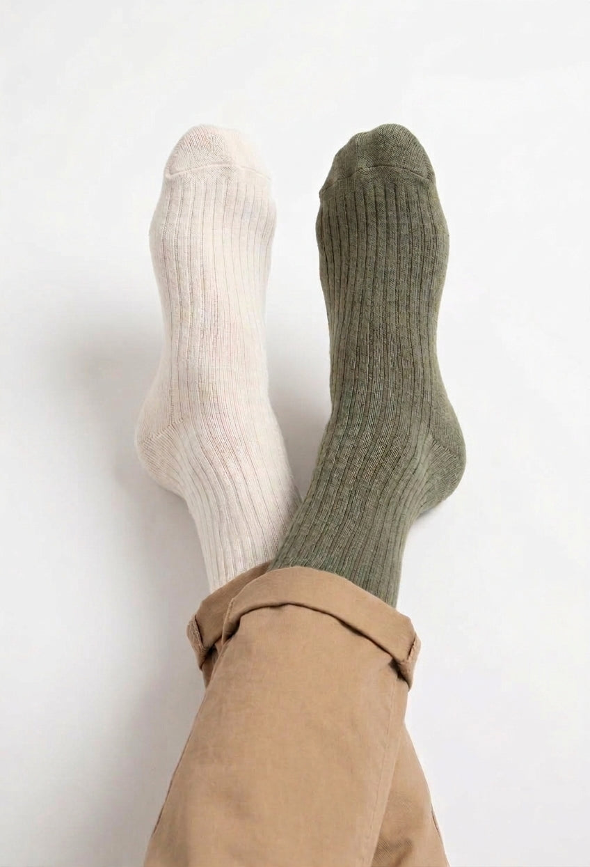 Ribbed crew socks, off-white and dark green, with cuff seam detail