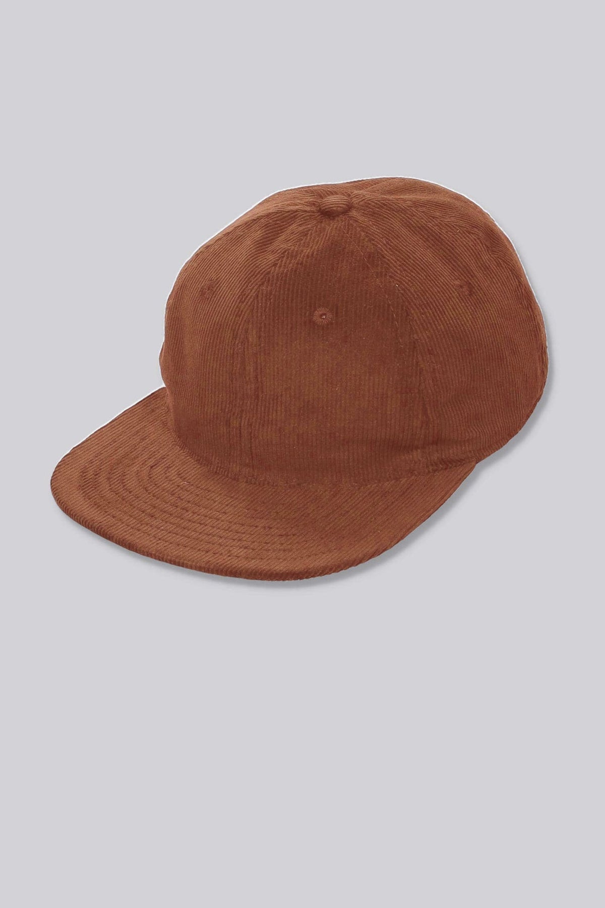 Rust orange corduroy baseball cap with curved brim and top button eyelets