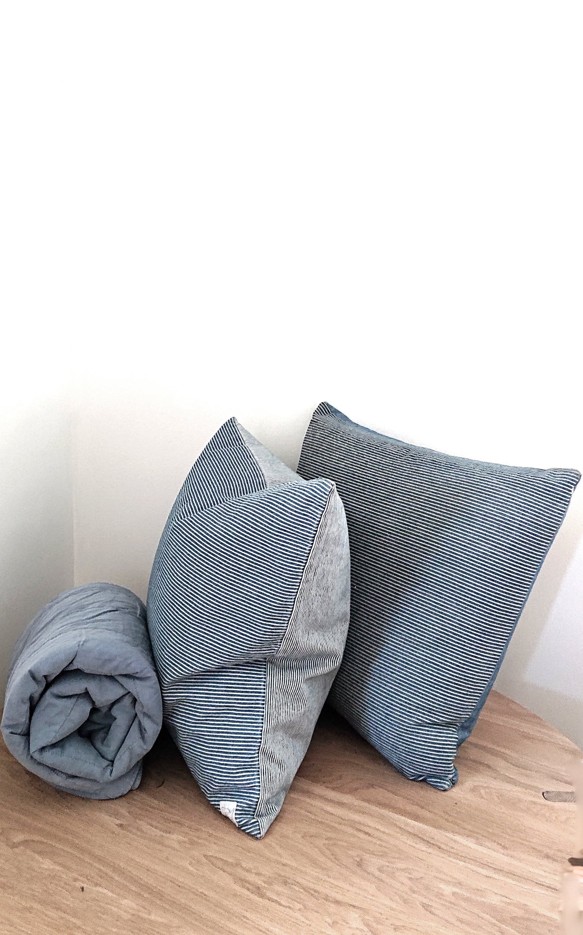 Indigo striped pillow front with blue herringbone back, two pillows