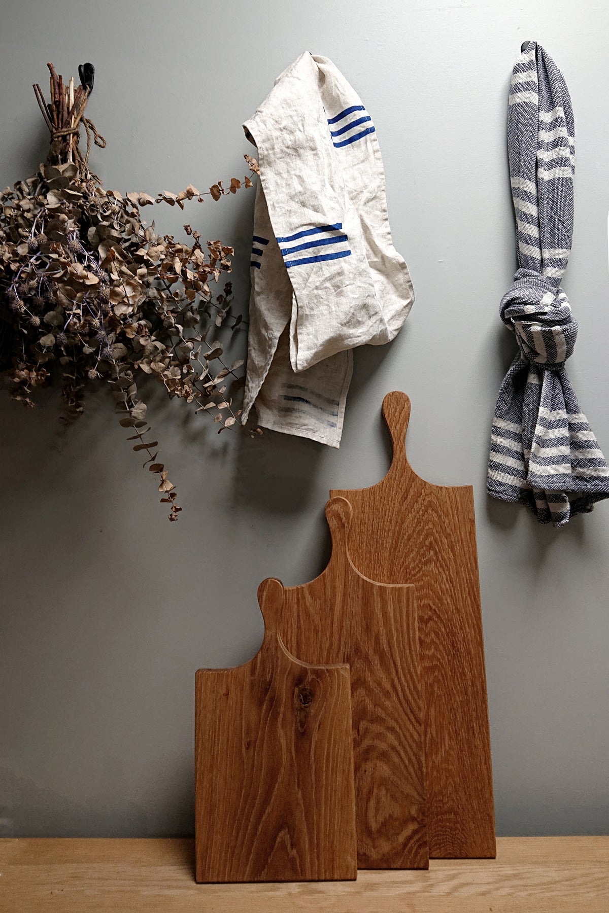 White oak charcuterie board set with two boards, U-shaped handle and curved corners