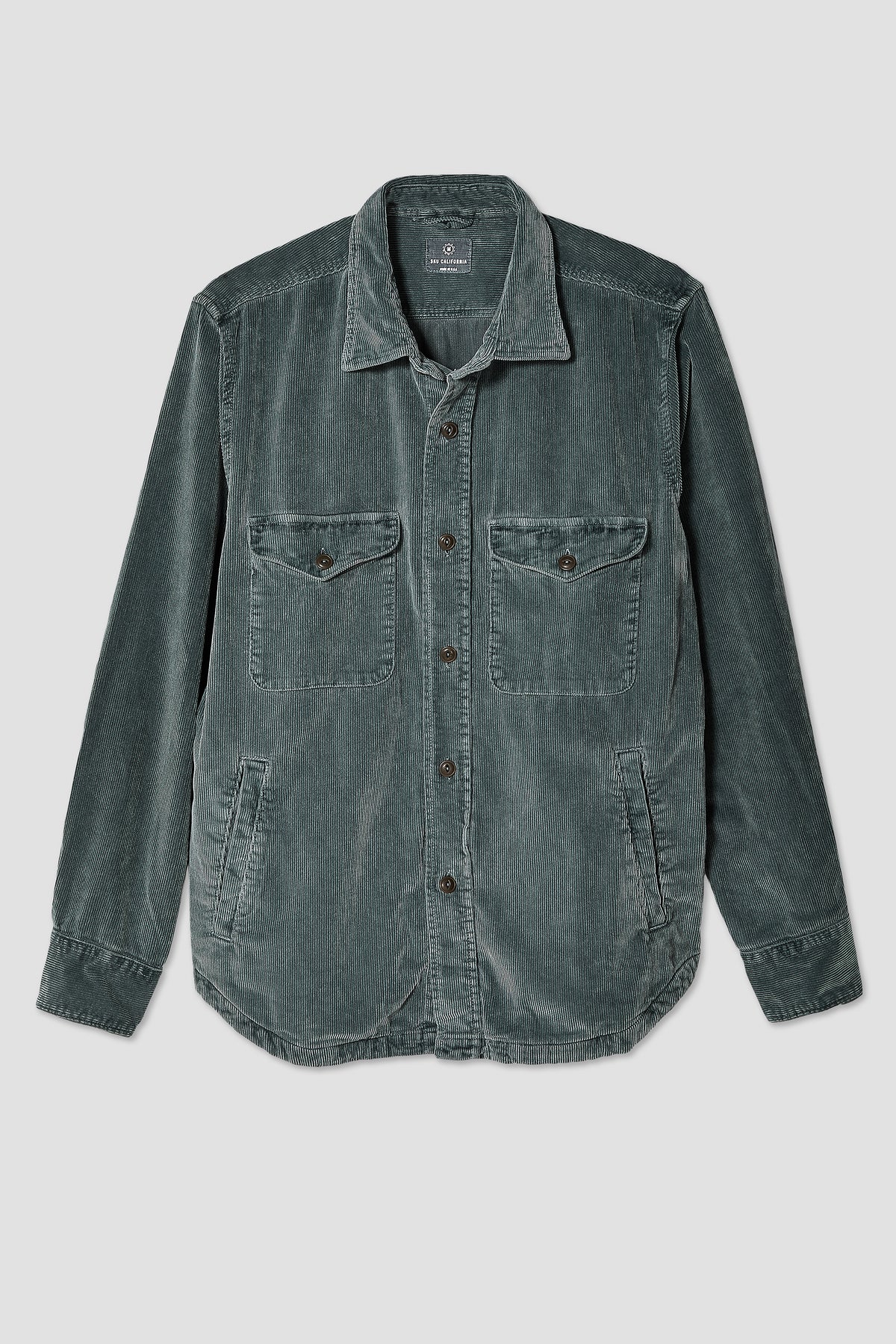 Teal corduroy shirt jacket with button front and two chest patch pockets