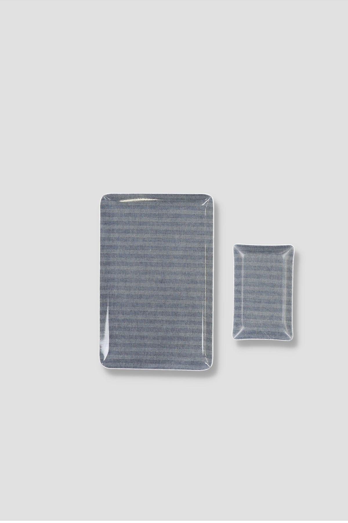 Set of two laminated rectangular trays, navy herringbone pattern, small tray included